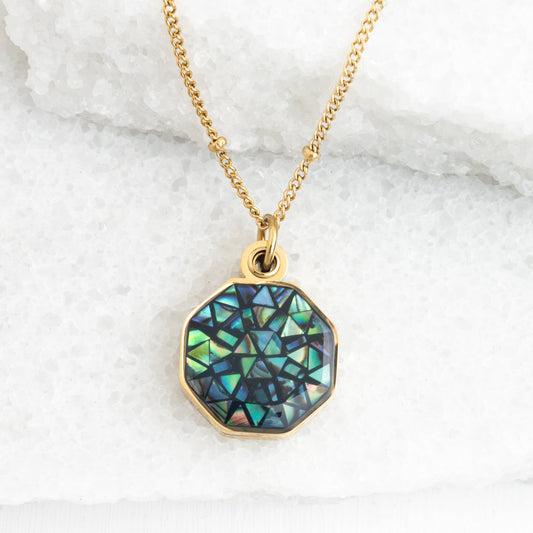 Photo of gold necklace with abalone, locket, shell necklace, gold and green jewelry, jewelry shops, fair trade quality jewelry