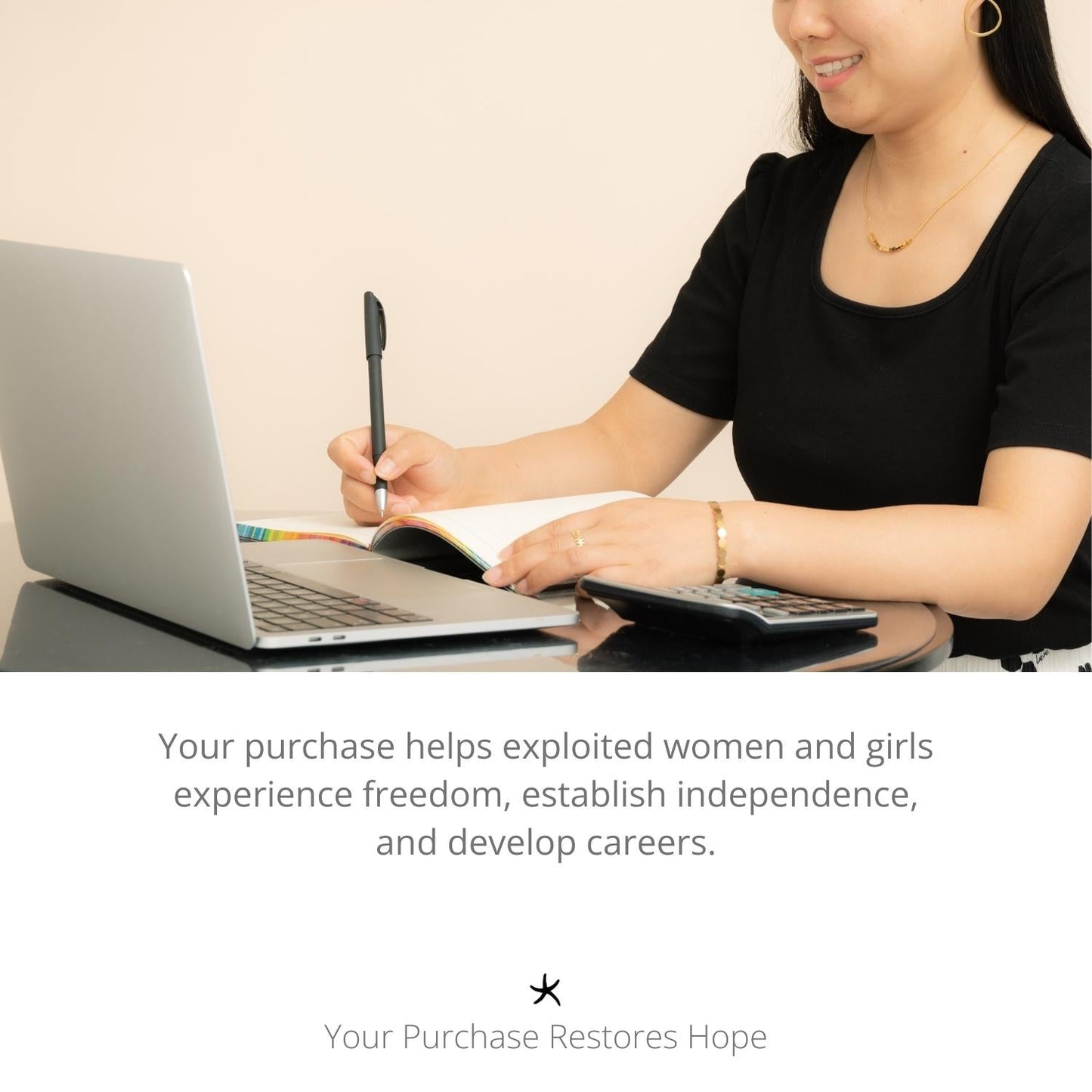 Photo of woman working on a laptop, career development, symbolism for hope, artisan jewelry, Starfish Project. jewelry company