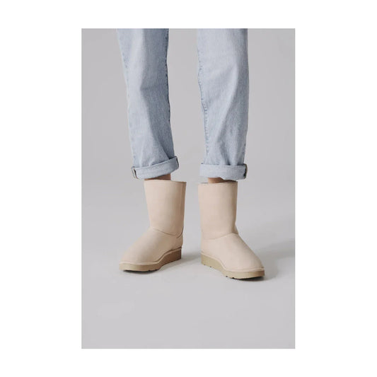 Ethical off-white mid-calf vegan boots with faux fur