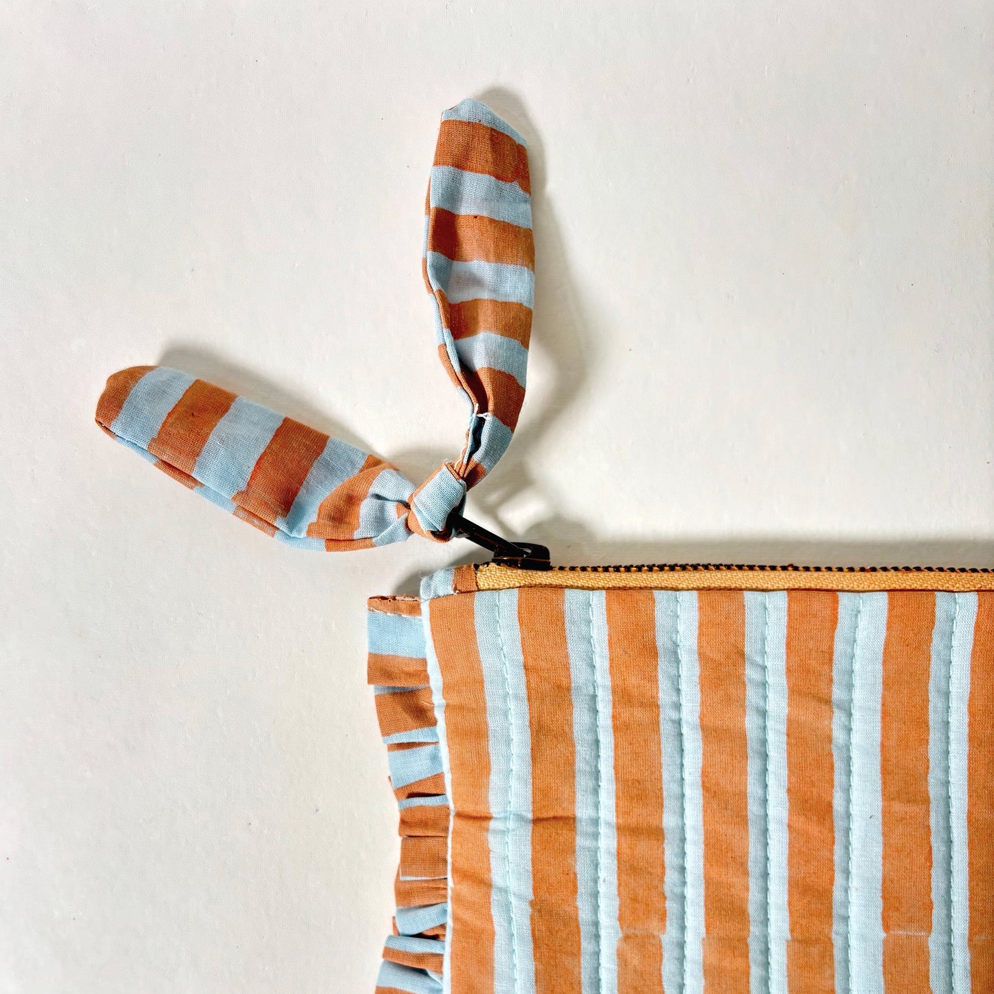 Quilted Cotton Travel Pouch with Ruffle Trim and Striped Design