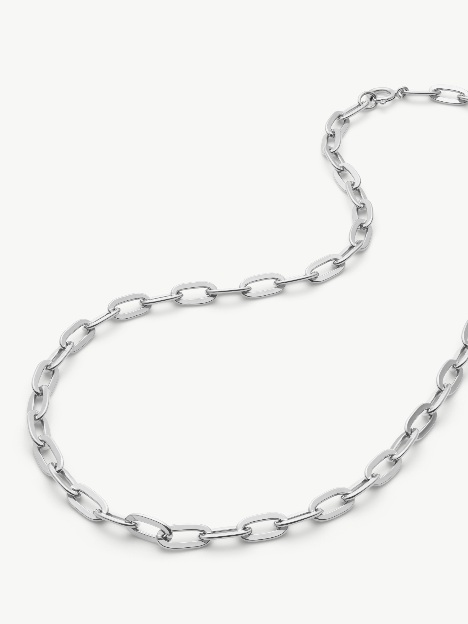 Silver chain necklace on a white background