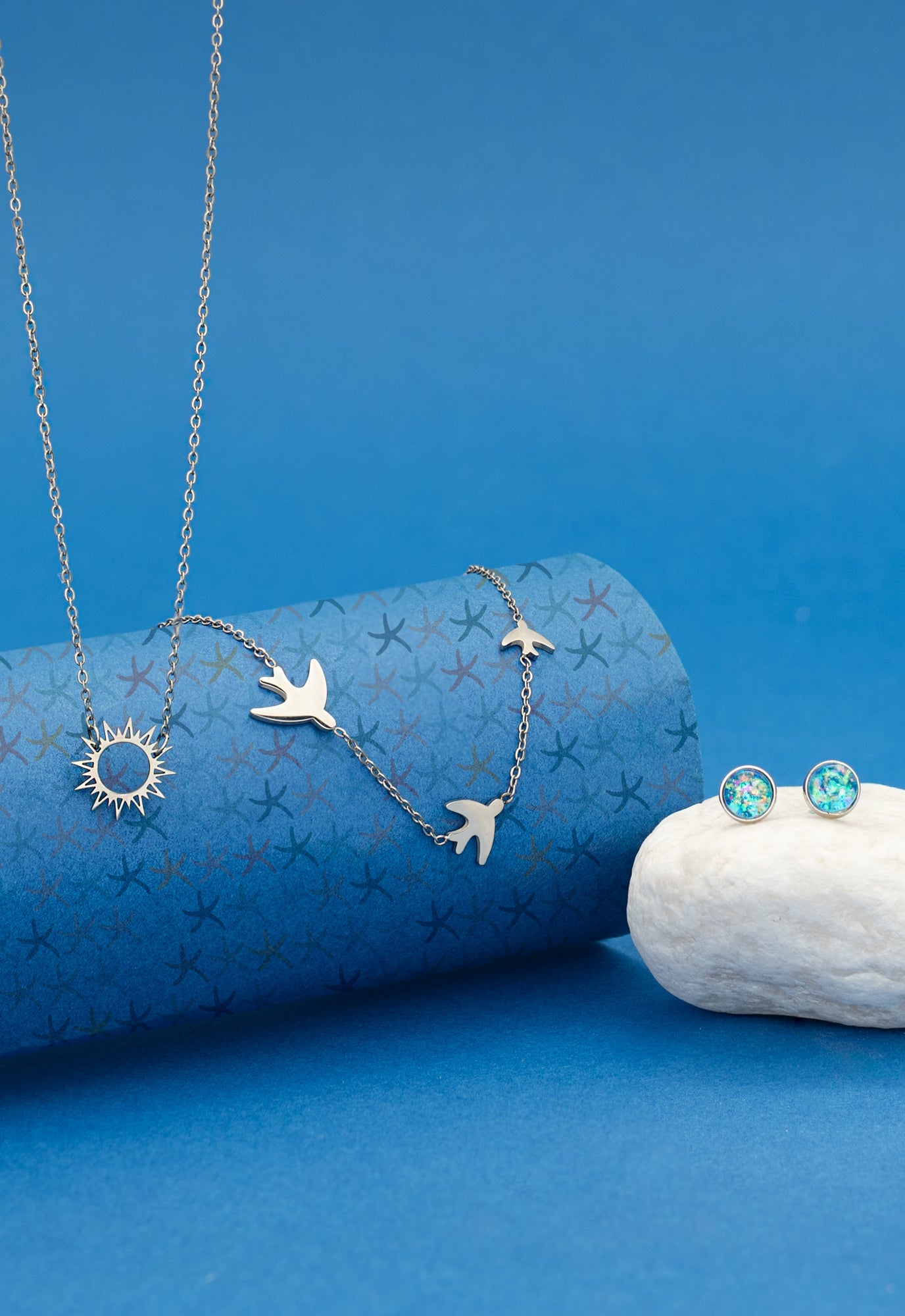 Fashion jewelry set, silver set of jewelry, cute silver jewelry pairings, sun necklace, bird necklace, blue and silver studs