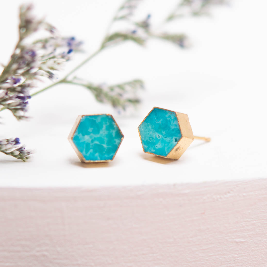 A set of turquoise and gold studs with floral background, beautiful jewelry for women, creative gift ideas for Christmas