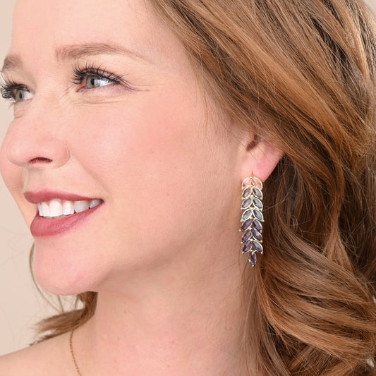 Woman wearing colorful dangling earrings, women's jewelry freedom business, best gift for mom for mother's day