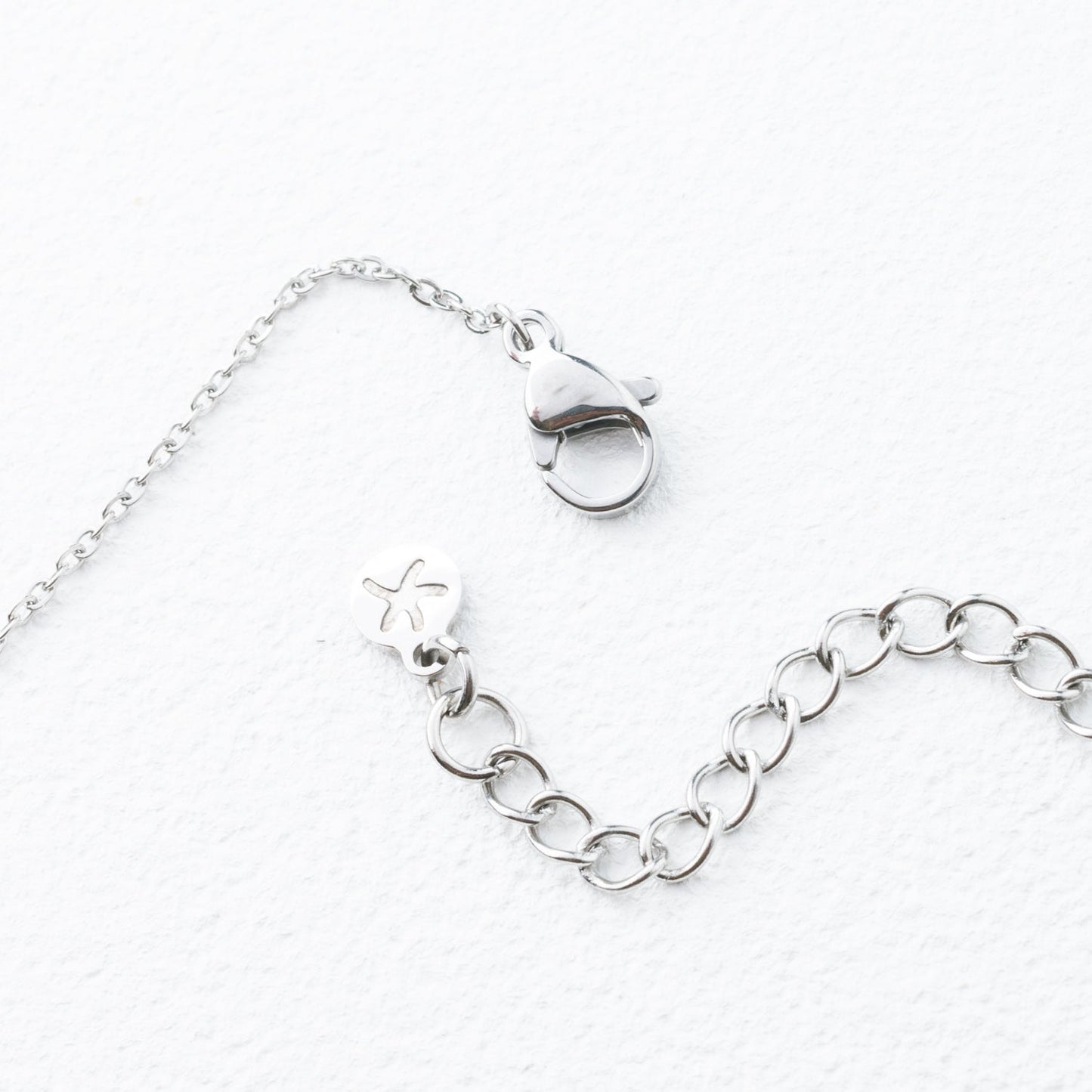 Silver plated chain, gift ideas for the holidays, fair trade gift companies, silver colored jewelry, starfish project logo, silver jewelry brand
