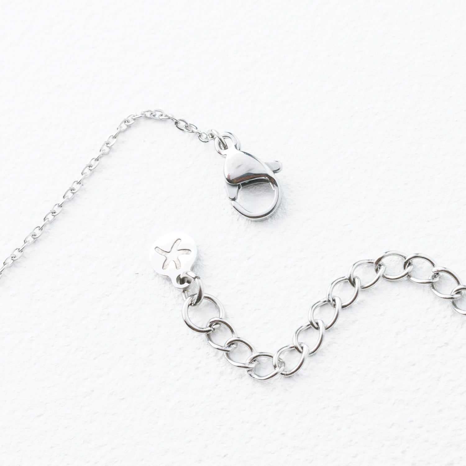 Silver plated chain, gift ideas for the holidays, fair trade gift companies, silver colored jewelry, starfish project logo, silver jewelry brand