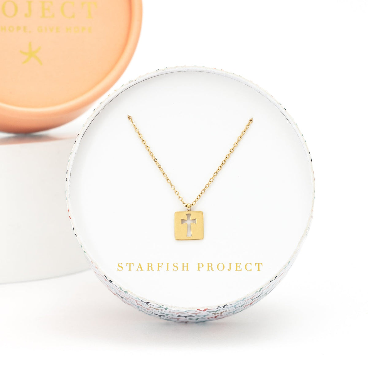Gold chain and cross pendant necklace, women's artisan jewelry company, fair trade gifting business