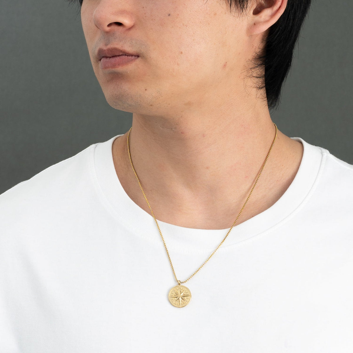 Man wearing engraved necklace, necklaces with a message, men's jewelry website, gold necklaces for men