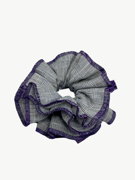 Plaid scrunchie with purple trim on a white background