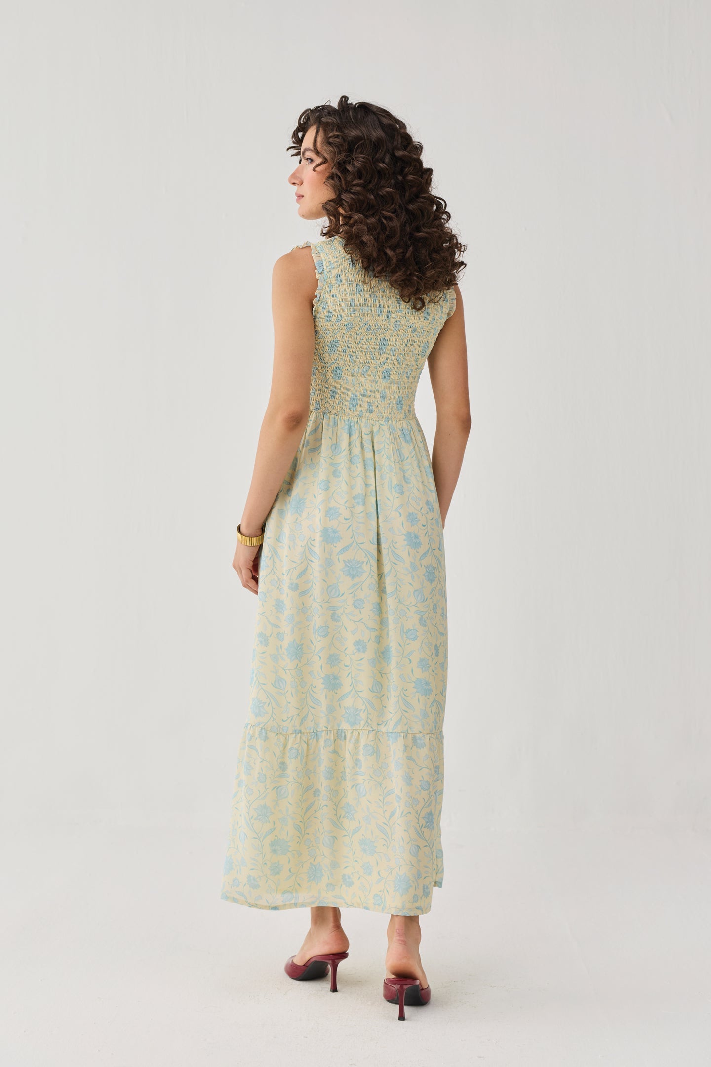 The Smocked Maxi Dress in Yellow Florals