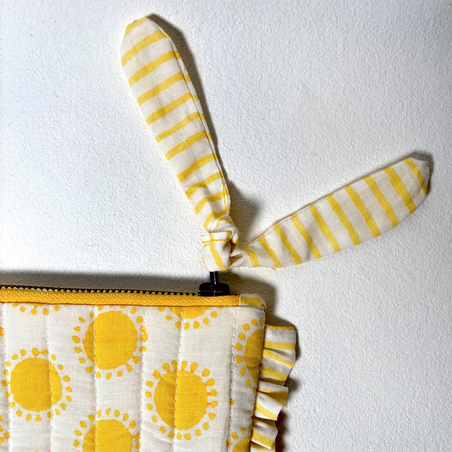 Quilted Cotton Travel Pouch with Sun Print and Ruffle Trim