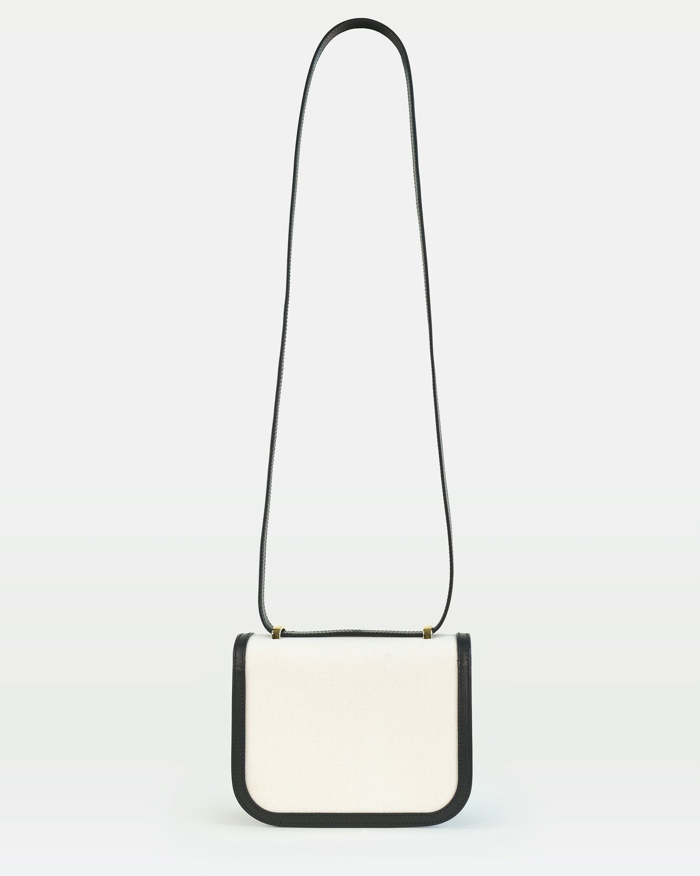 Maya crossbody bag in vegetable calfskin leather and canvas