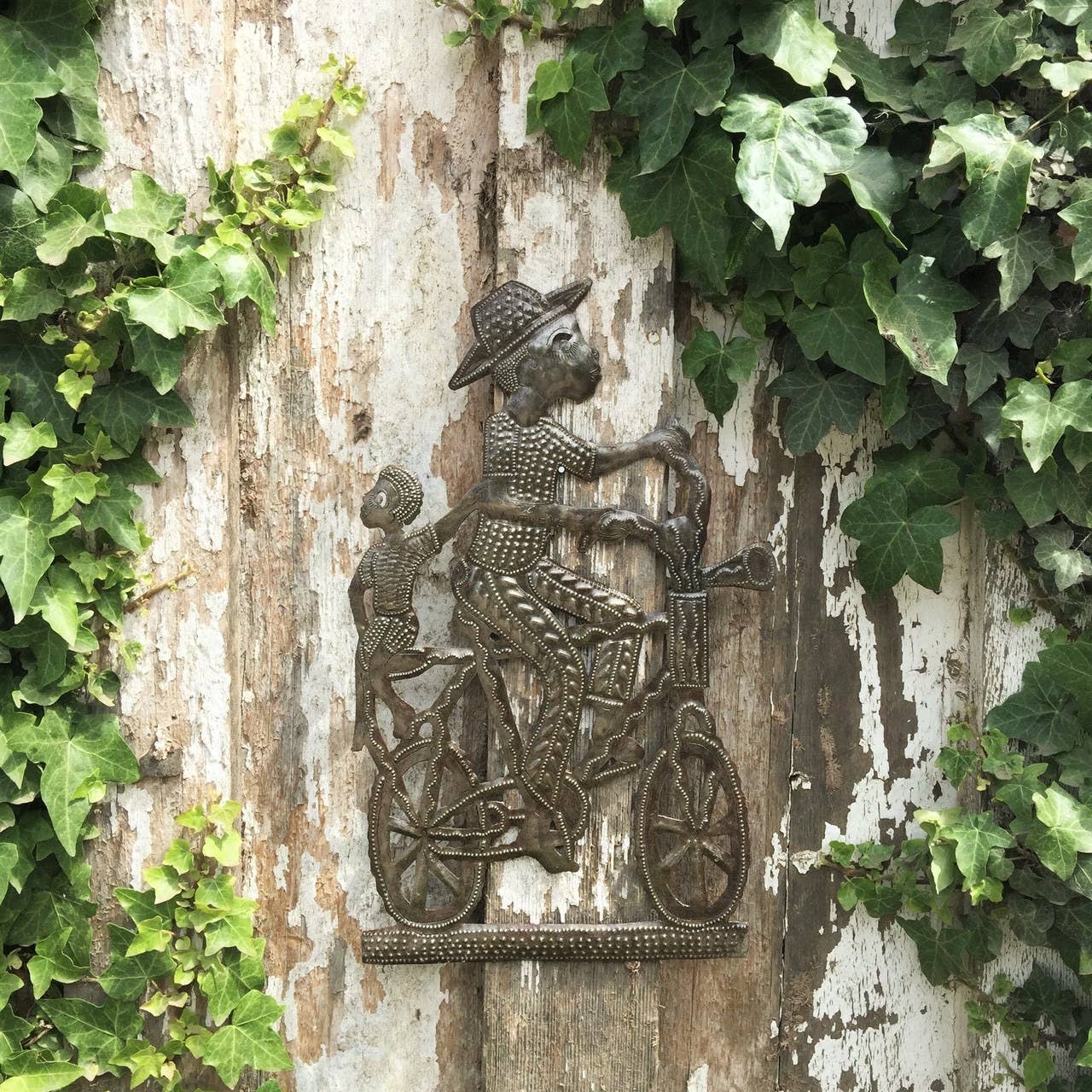 Haitian Metal Wall Art Boy on Bicycle Fair Trade Recycled