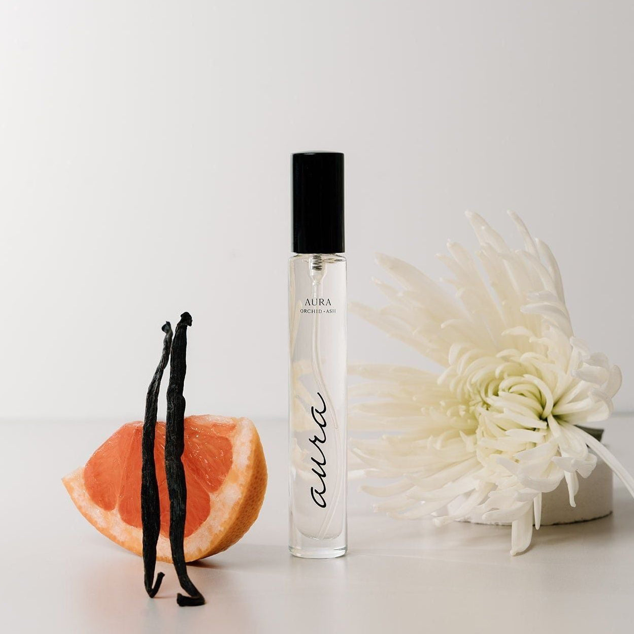 grapefruit + tonka bean | AURA Perfume Travel Spray