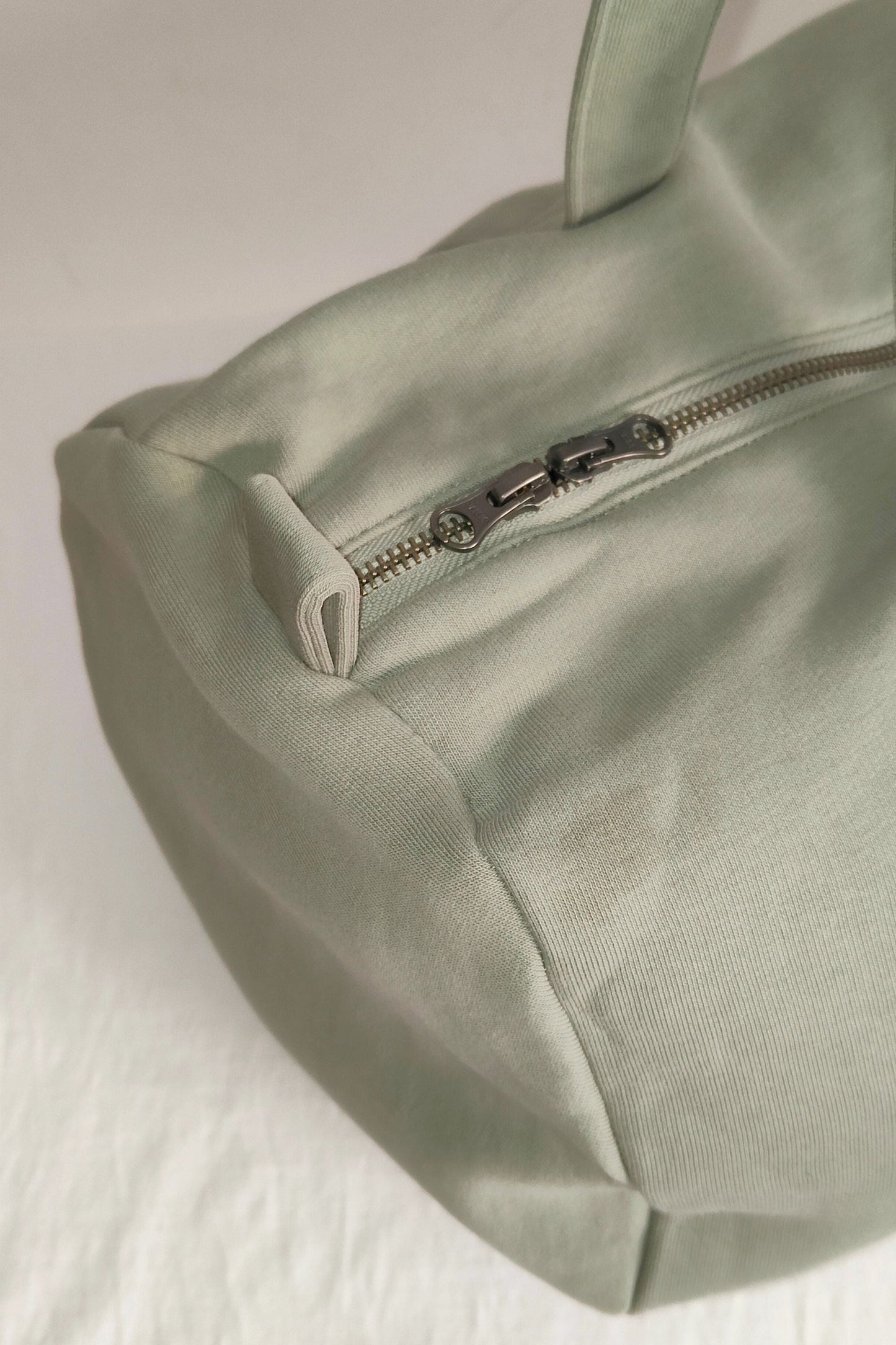 Bolsa de viaje sostenible - Verde Almendra