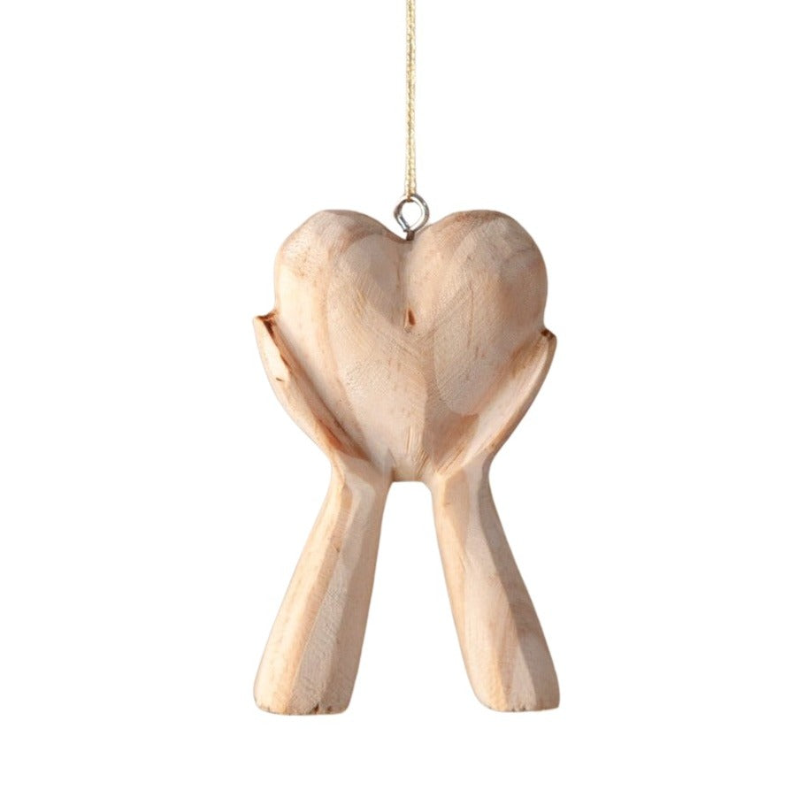 Hands Holding Heart Ornament