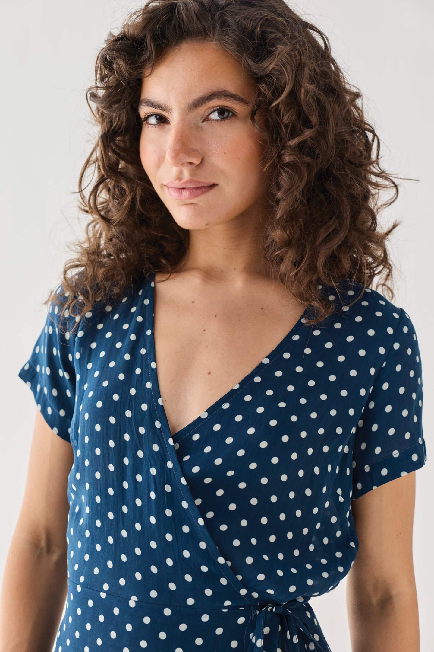 Wrap-Around Top in Navy Blue Polka