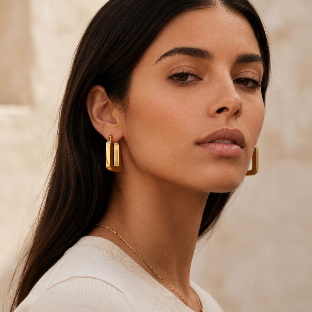 The U 18k Gold plated Stainless Steel Hoop Earrings
