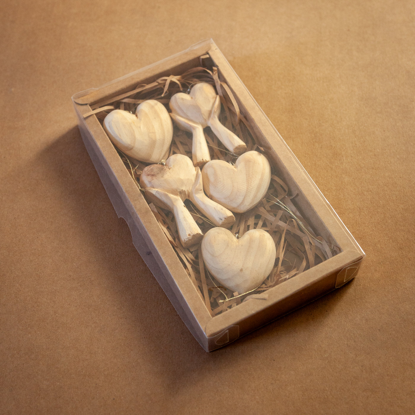 Hands Holding Heart Ornament