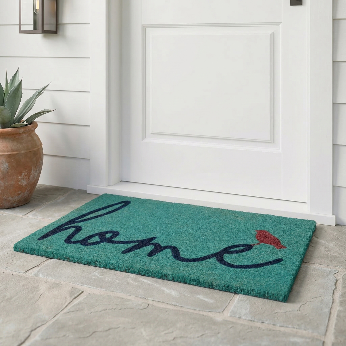 A Bird Perched on Home Coir Doormat