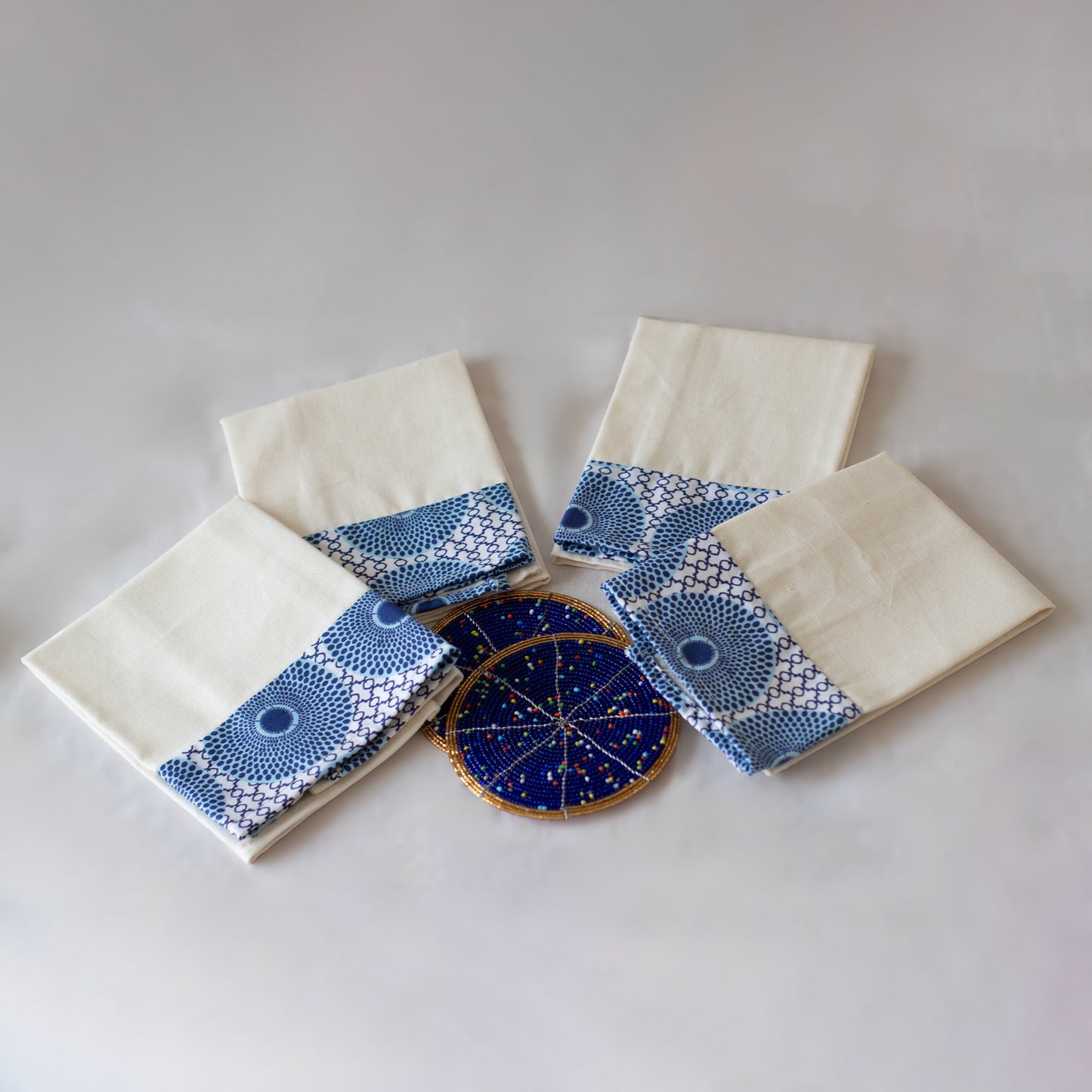 Kitenge-trimmed cotton table napkins showing colorful African print border