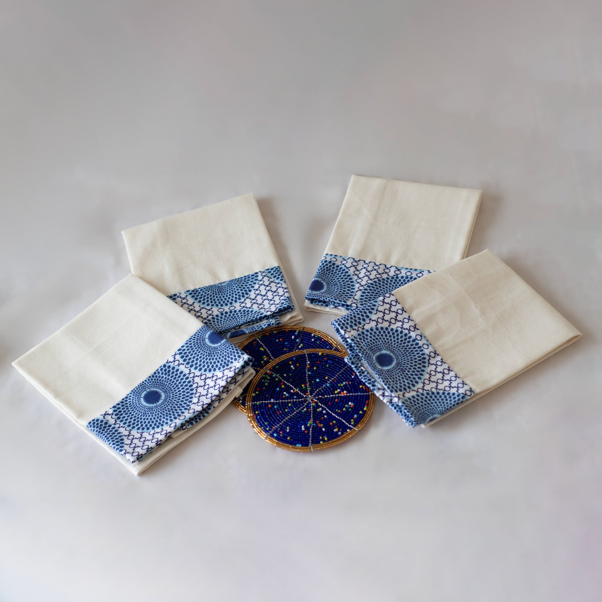 Kitenge-trimmed cotton table napkins showing colorful African print border