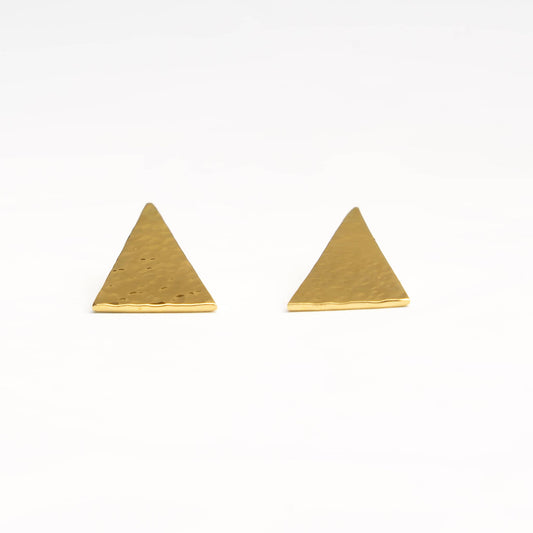 Amali brass hammered triangle stud earrings worn on ear