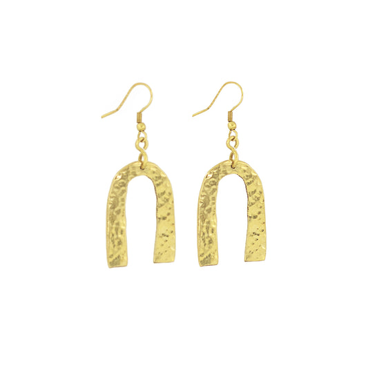 Bundi open arch brass statement earrings flat lay — Ecodunia