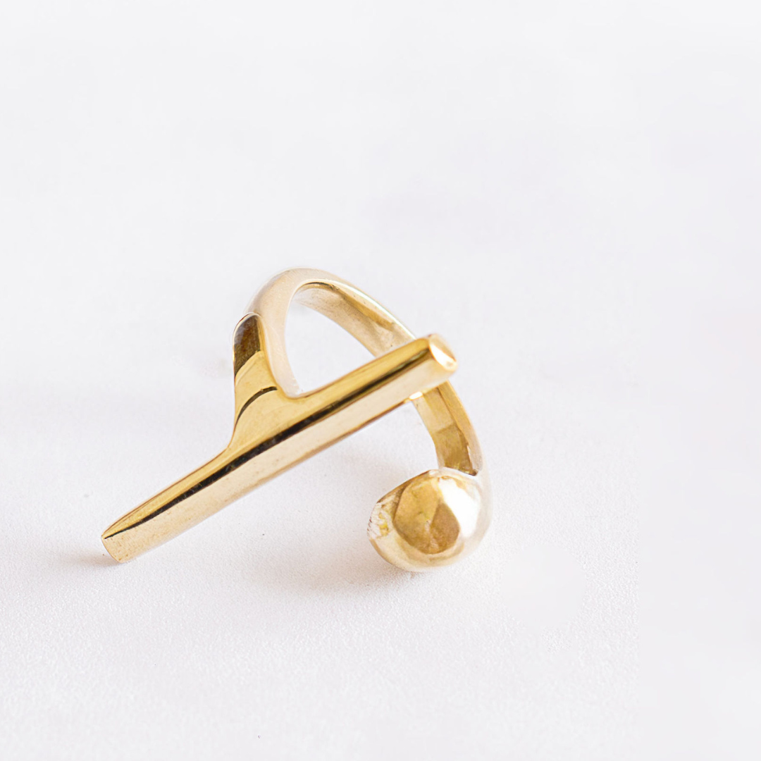 Shaba asymmetric brass bar teardrop ring flat lay — Ecodunia