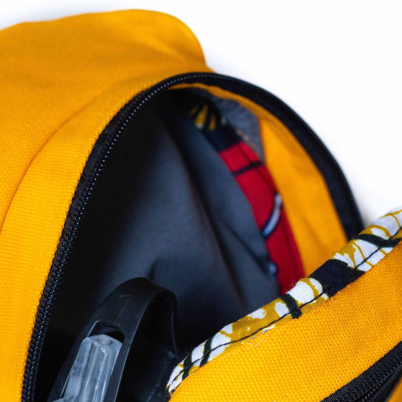 Umoja orange artisan canvas sling bag detail #color_orange