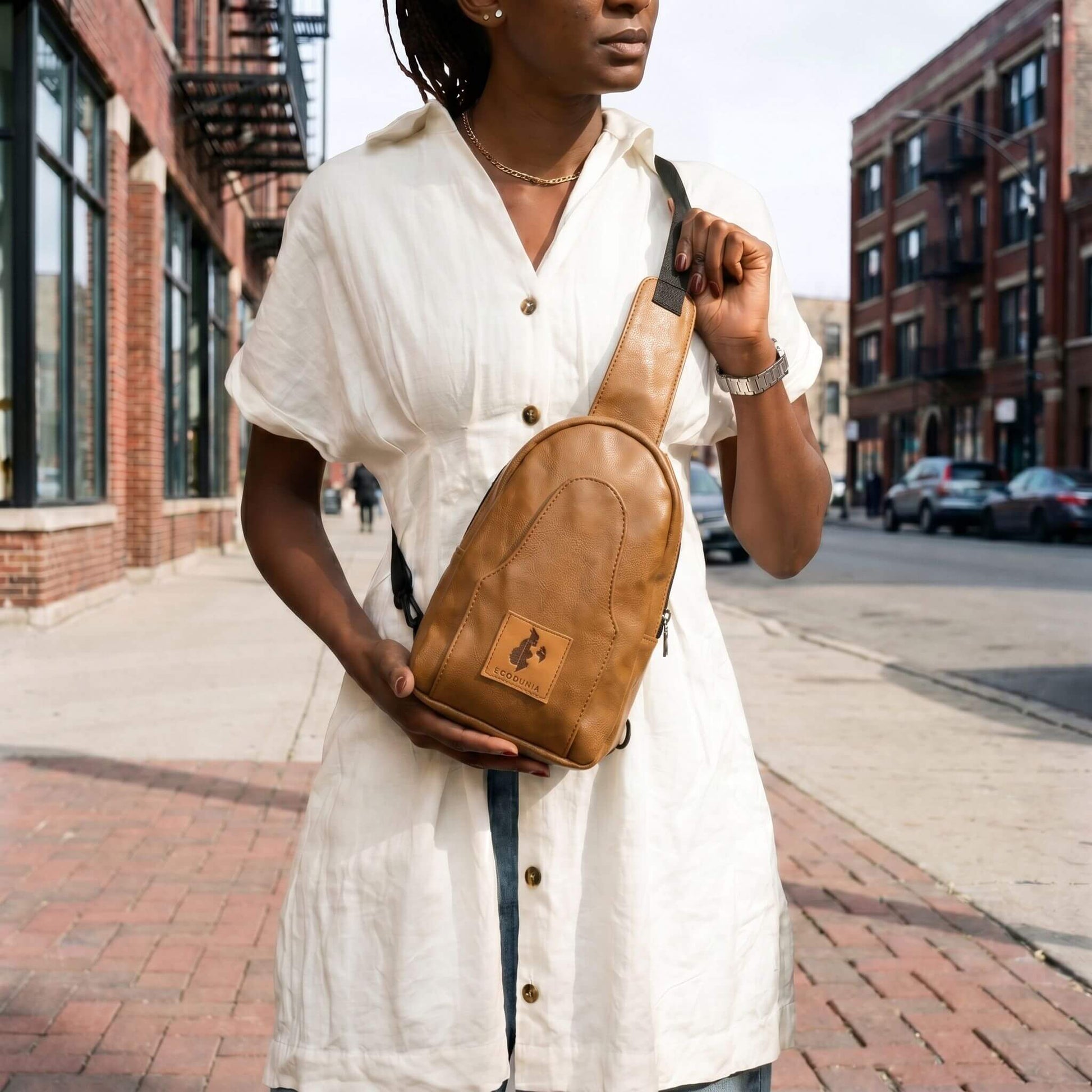 Buru dark tan vegan leather hands-free sling bag #color_dark-tan