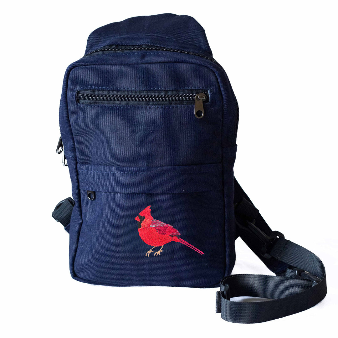 Cardinal Umoja embroidered canvas sling bag with birds #color_navy-blue