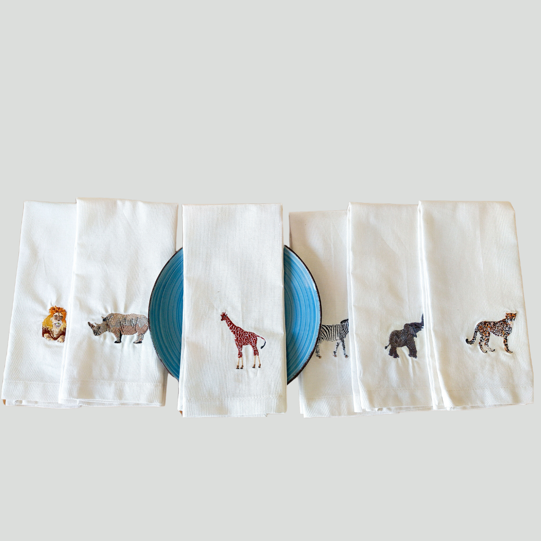 Unbleached cotton tea towel with African wildlife embroidery