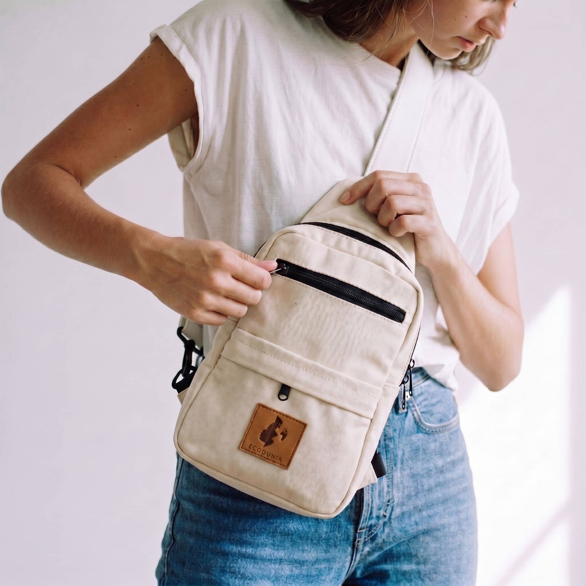 Umoja cream vegan leather men crossbody sling bag #color_cream
