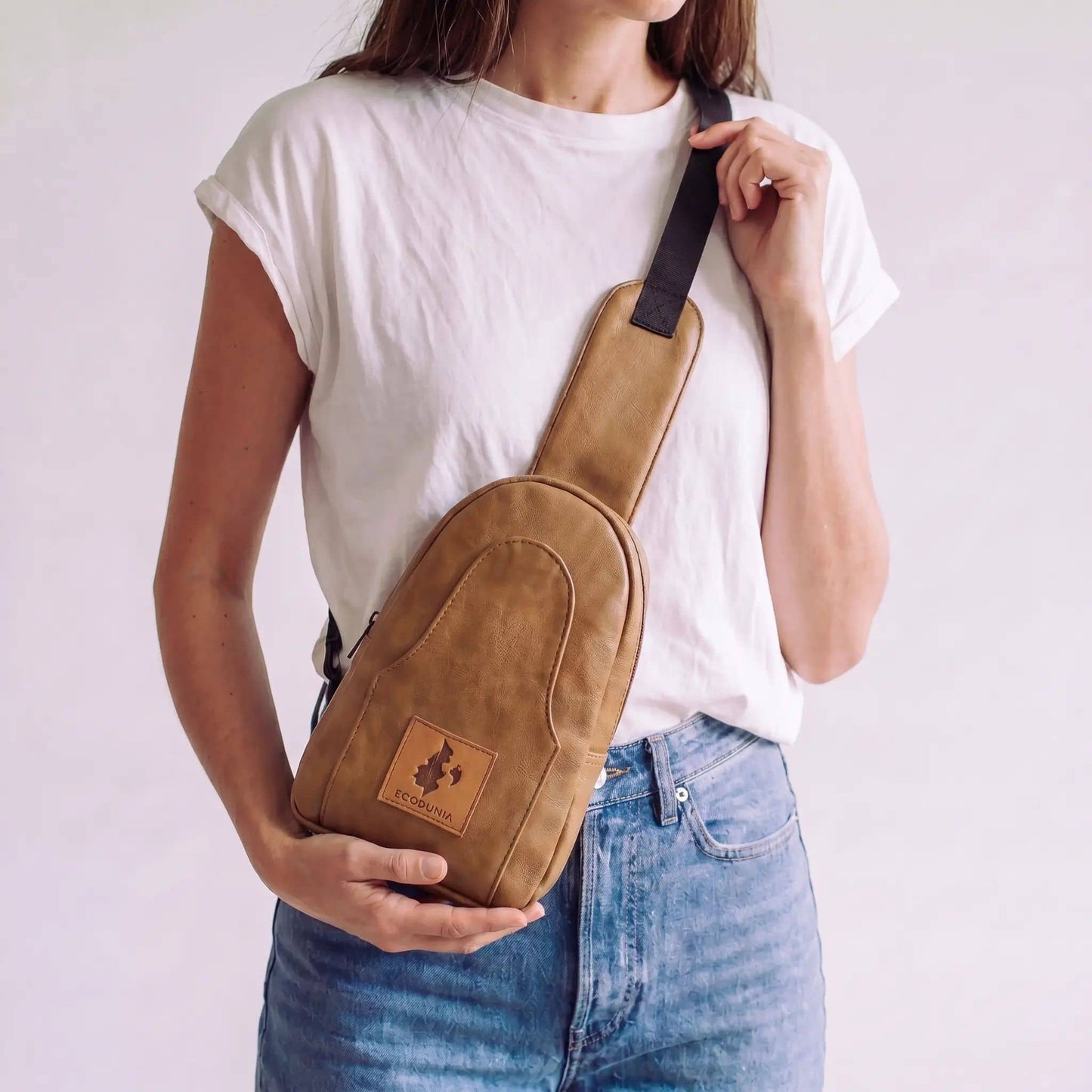 Buru dark tan vegan leather hands-free sling bag #color_dark-tan