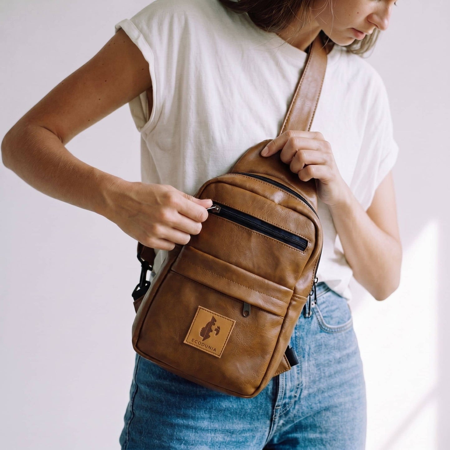 Umoja dark tan vegan leather large crossbody sling bag — Ecodunia #color_dark-tan