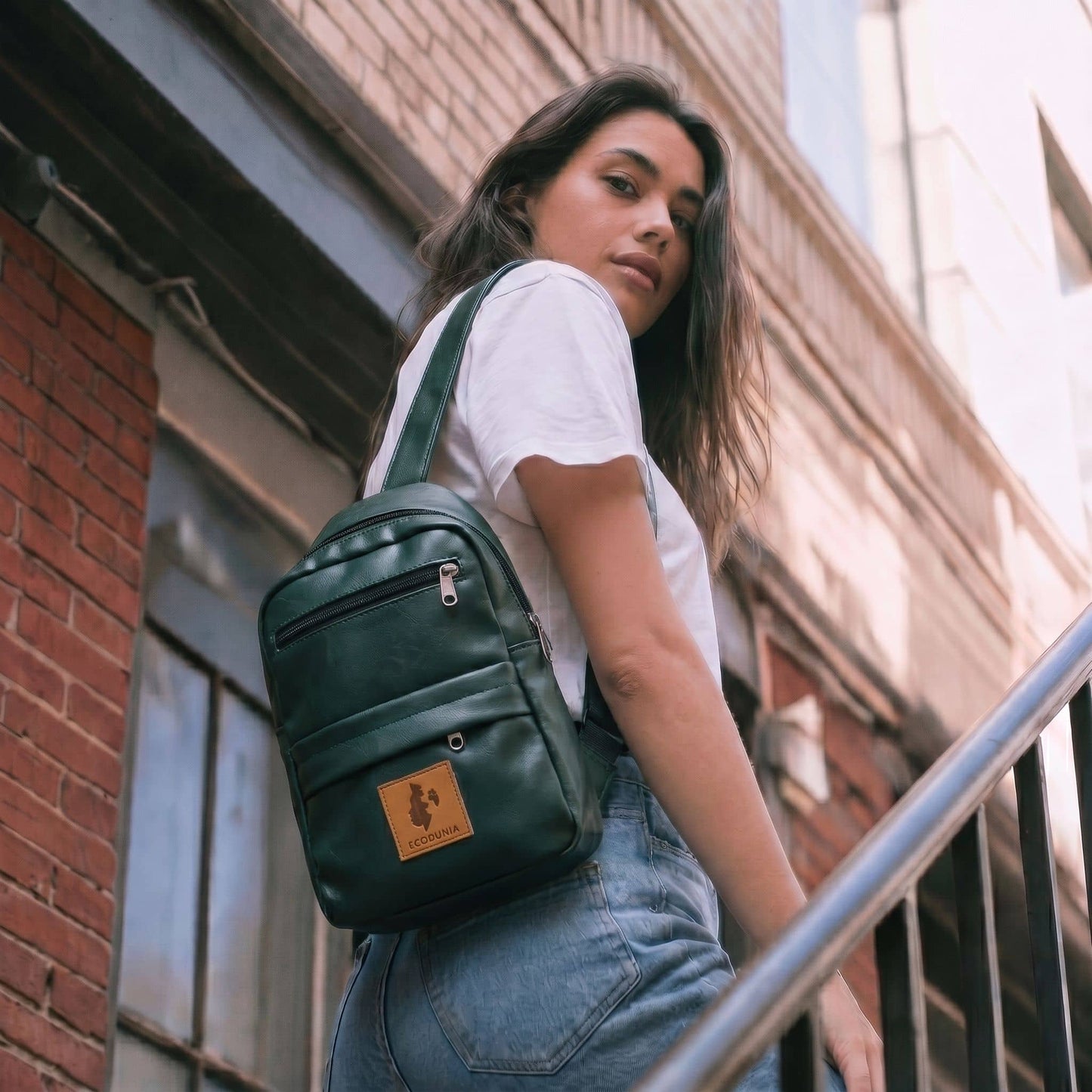 Umoja forest green vegan leather sling bag #color_forest-green