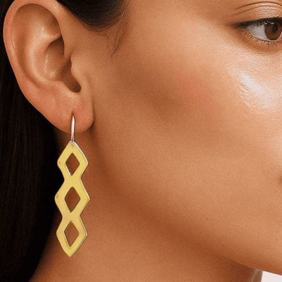 Chaka linked diamond lattice brass drop earrings flat lay — Ecodunia