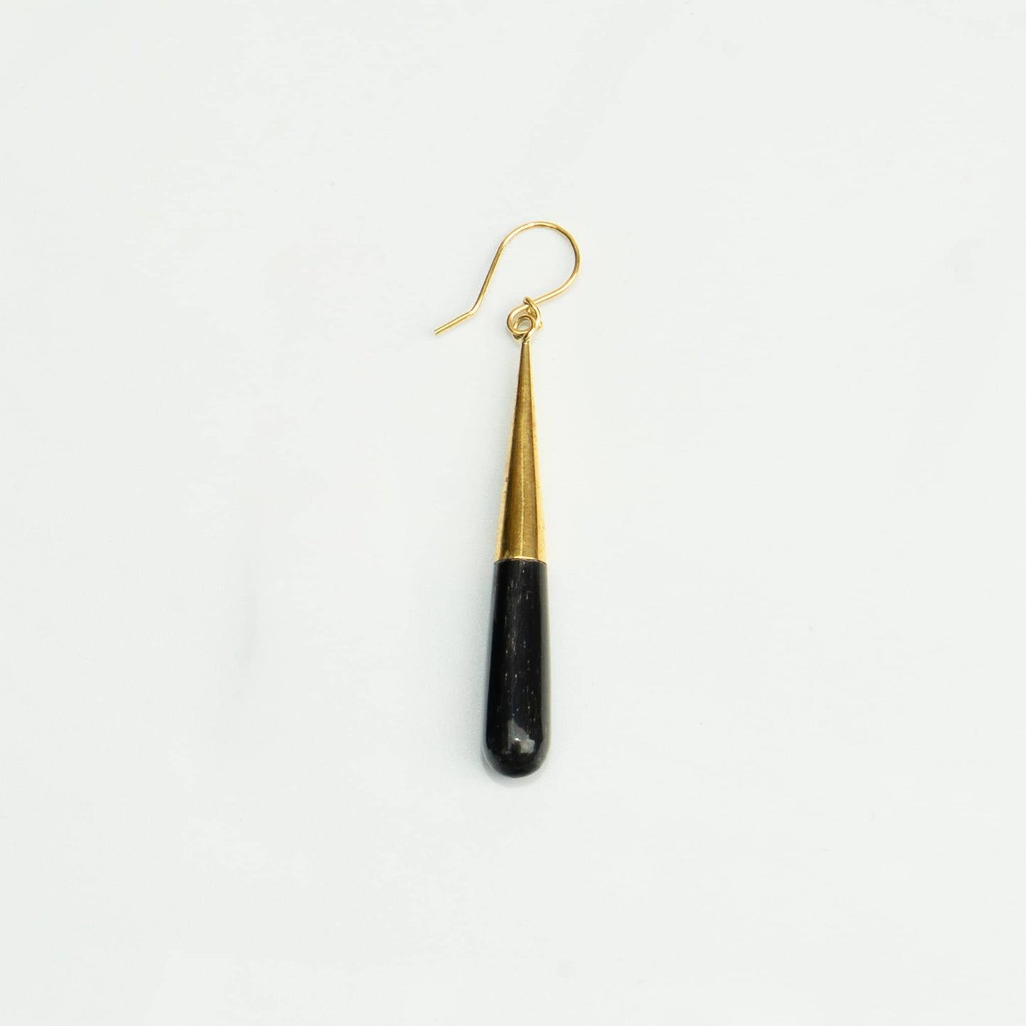 Guru brass and black horn teardrop earrings flat lay — Ecodunia