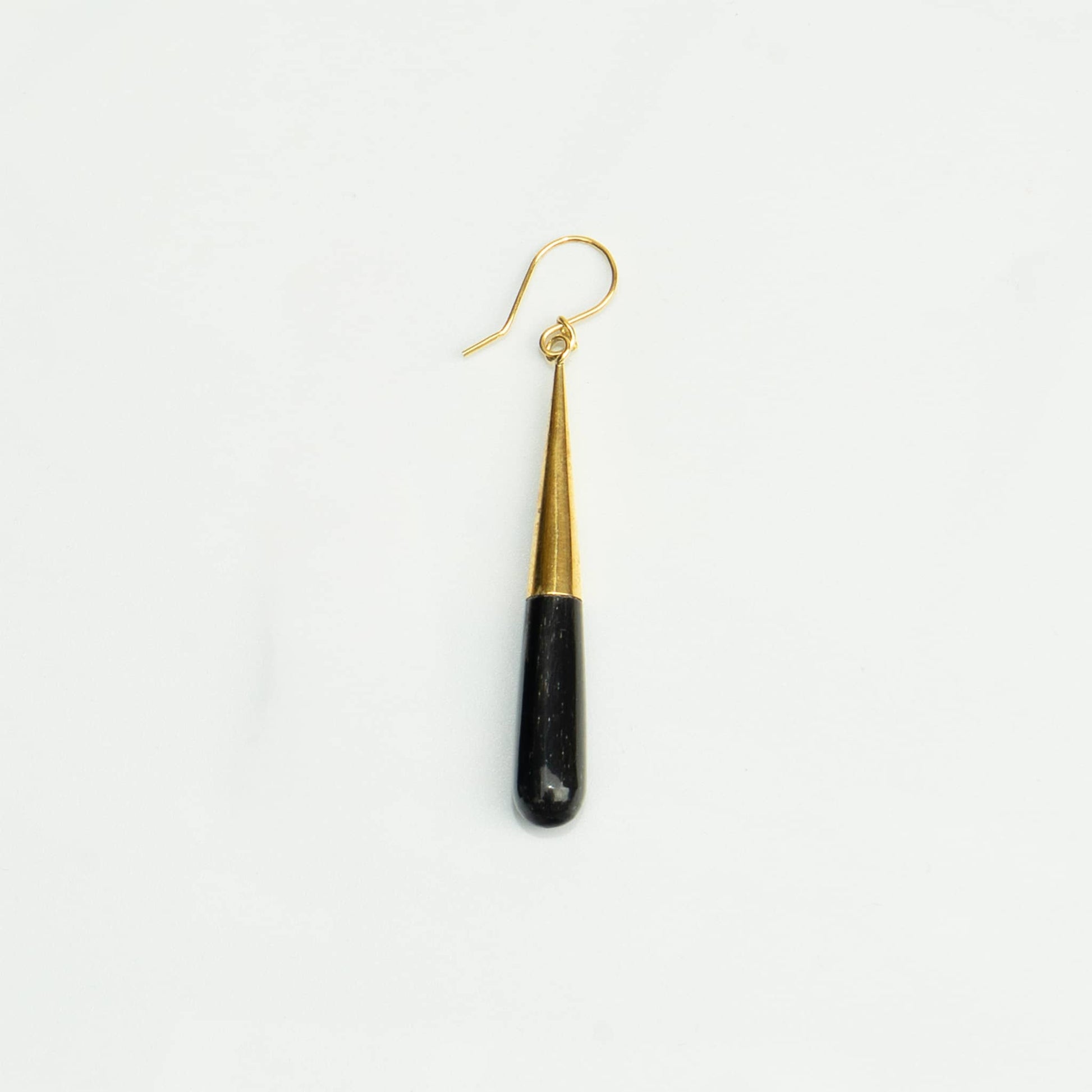 Guru brass and black horn teardrop earrings flat lay — Ecodunia