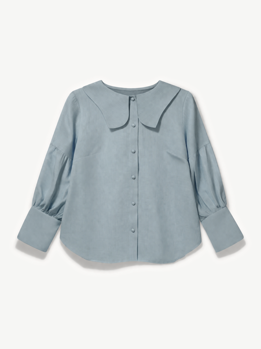 Light blue shirt with a collar on a white background