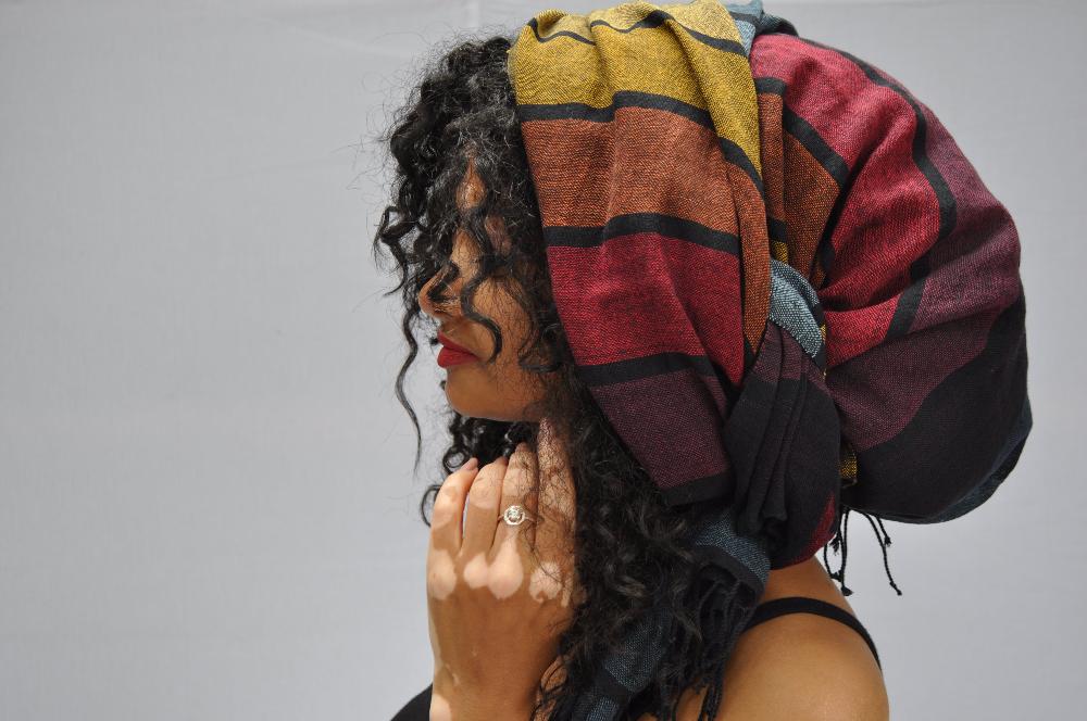 Hassate shawl wrapped around hair of female model