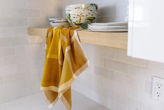 Jane Kitchen Towel in Gold by Kitchen Counter 