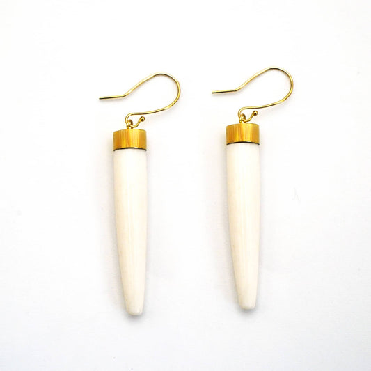 Liwa brass and white bone spike drop earrings flat lay — Ecodunia