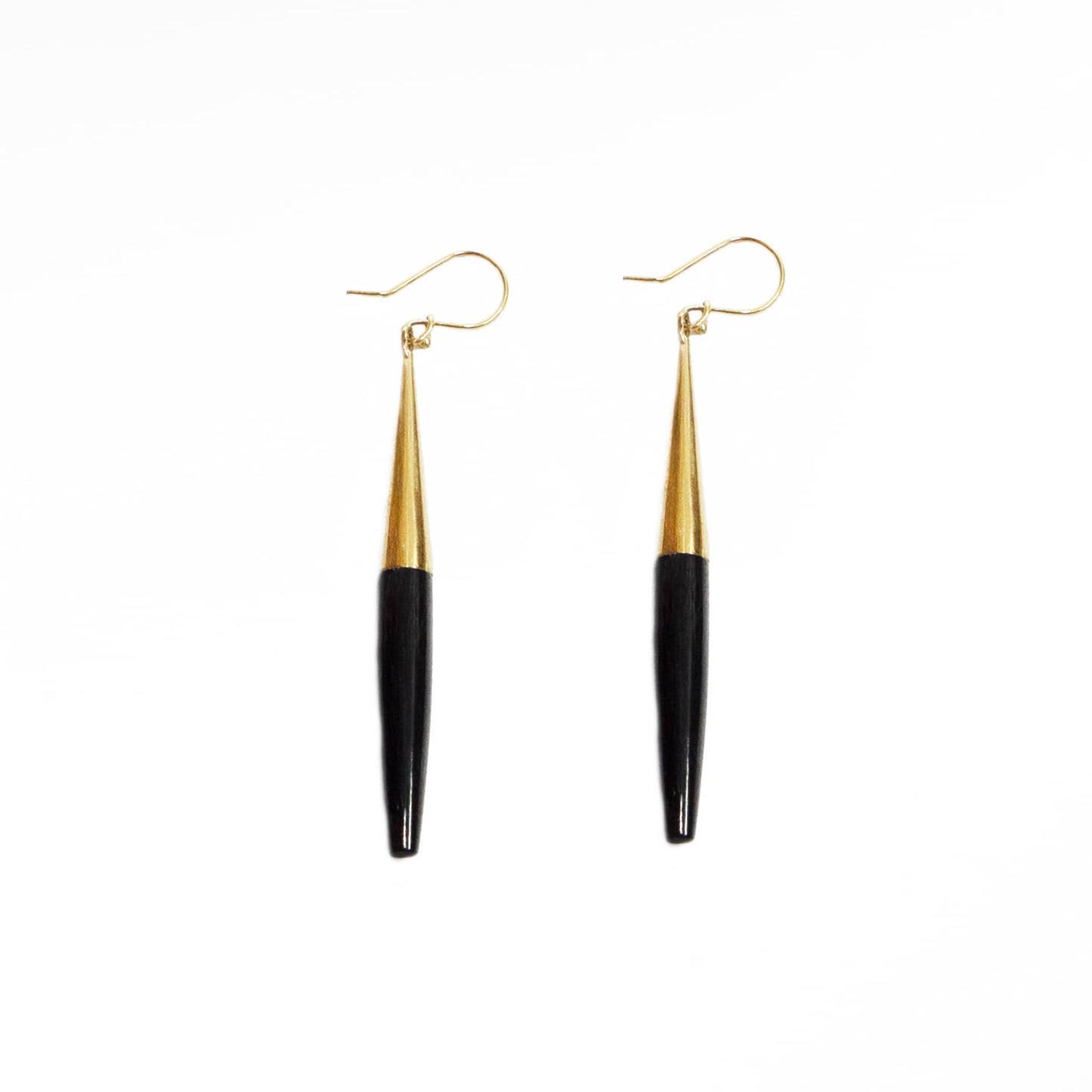 Luna brass and white horn spike drop earrings flat lay — Ecodunia