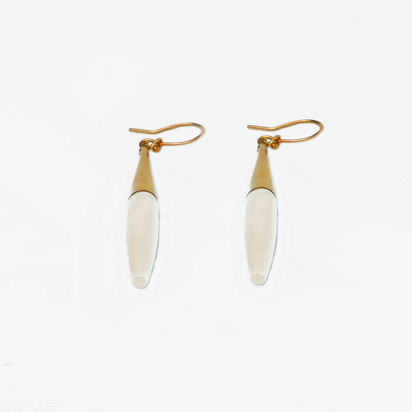 Luna black horn brass spike earrings worn showing natural contrast