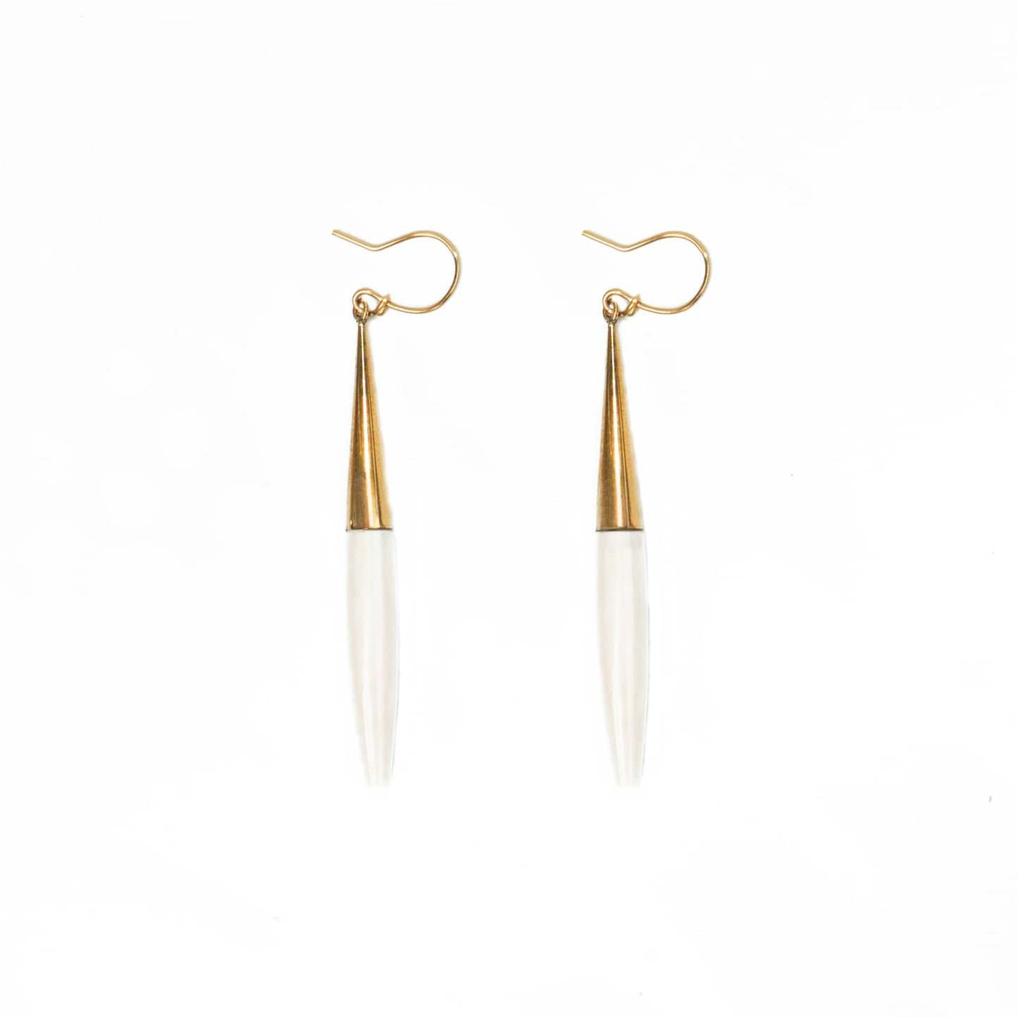 Luna brass and black horn spike drop earrings flat lay — Ecodunia