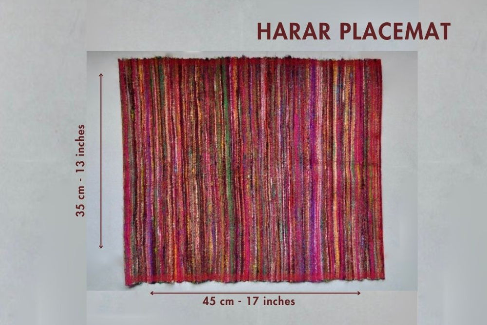 Multicolored Harar placemat with dimensions on a light gray background