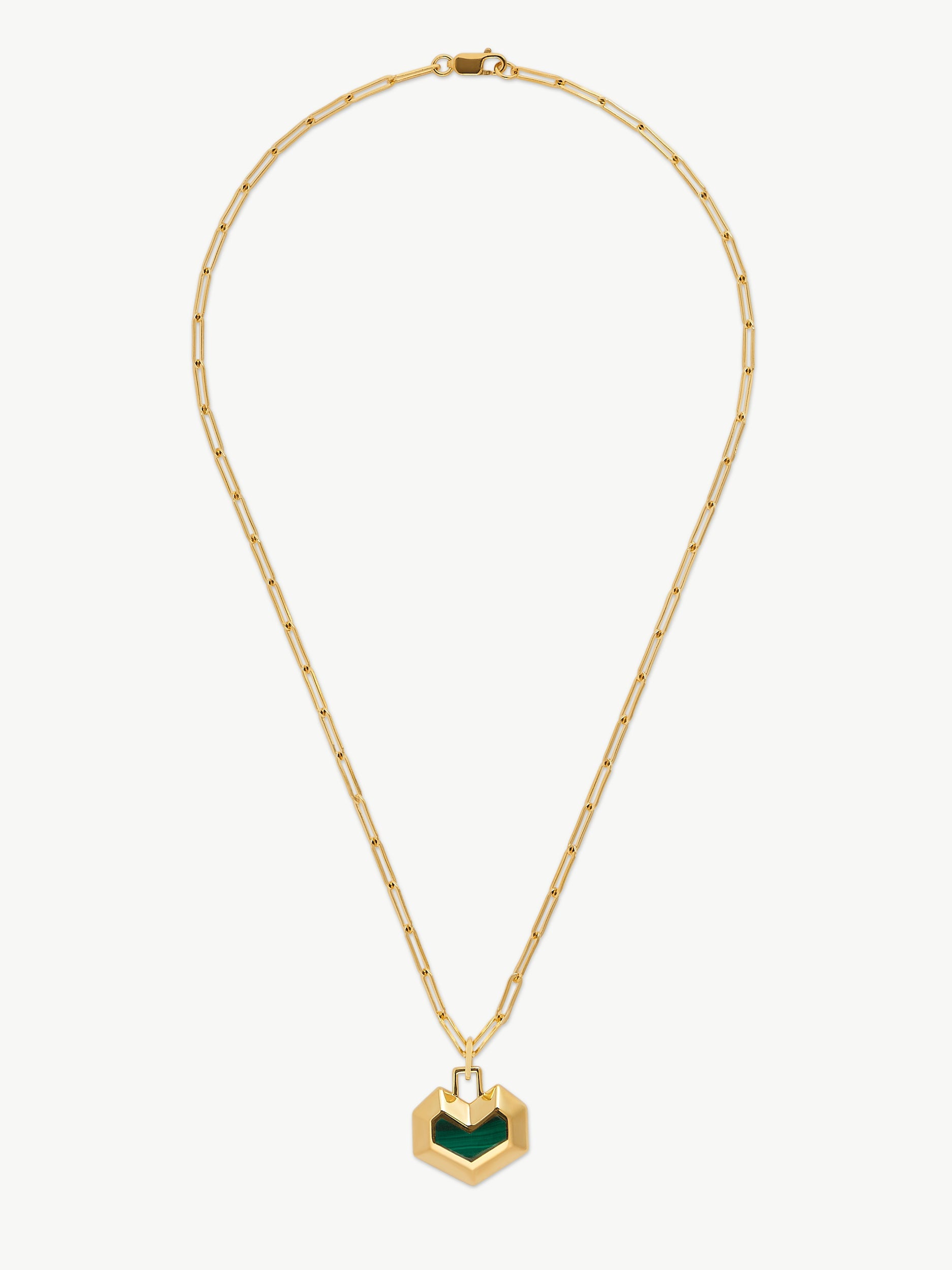Gold necklace with a green heart pendant on a white background