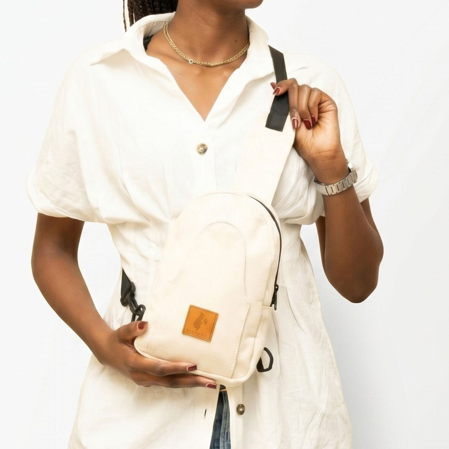 Buru small canvas sling bag in natural #color_natural
